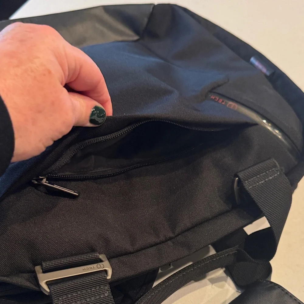 Tumi Black Messenger Bag excellent condition stay organized.